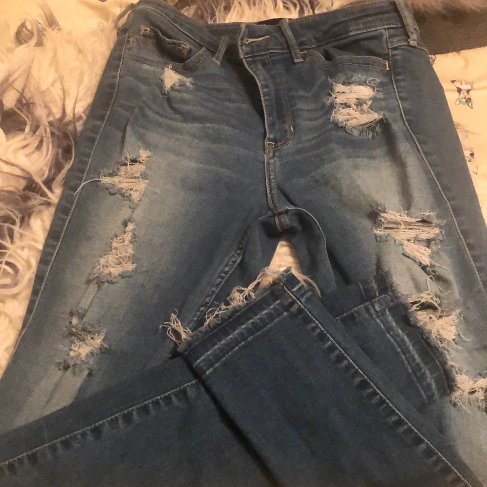 Distressed blue jeans